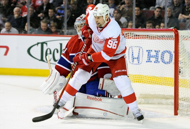 MONTREAL, CANADA - JANUARY 25:  Tomas Holmstrom #96 of the Detroit Red Wings screens Carey Price #31 of the Montreal Canadiens during the NHL game at the Bell Centre on January 25, 2012 in Montreal, Quebec, Canada.  (Photo by Richard Wolowicz/Getty Images)