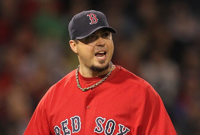 BOSTON, MA - SEPTEMBER 16:  Josh Beckett #19 of the Boston Red Sox reacts after getting out of trouble in the fourth inning against the Tampa Bay Rays at Fenway Park September 16, 2011 in Boston, Massachusetts. (Photo by Jim Rogash/Getty Images)