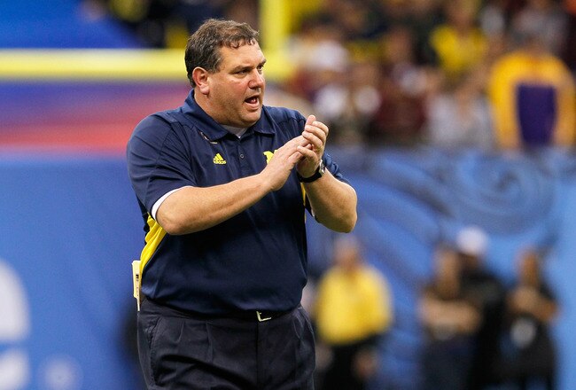 NEW ORLEANS, LA - JANUARY 03:  Head coach Brady Hoke of the Michigan Wolverines applauds his teams play against the Virginia Tech Hokies during the Allstate Sugar Bowl at Mercedes-Benz Superdome on January 3, 2012 in New Orleans, Louisiana.  (Photo by Kevin C. Cox/Getty Images)