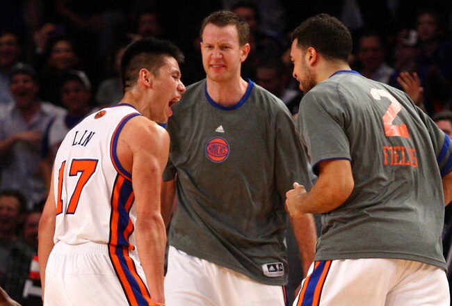 NEW YORK, NY - FEBRUARY 10:  (L-R) Jeremy Lin #17, Steve Novak #16 and Landry Fields #2 of the New York Knicks celebrate after Lin made a 3-point basket in the fourth quarter at Madison Square Garden on February 10, 2012 in New York City.  NOTE TO USER: User expressly acknowledges and agrees that, by downloading and or using this photograph, User is consenting to the terms and conditions of the Getty Images License Agreement.  (Photo by Chris Chambers/Getty Images)