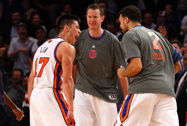 NEW YORK, NY - FEBRUARY 10:  (L-R) Jeremy Lin #17, Steve Novak #16 and Landry Fields #2 of the New York Knicks celebrate after Lin made a 3-point basket in the fourth quarter at Madison Square Garden on February 10, 2012 in New York City.  NOTE TO USER: User expressly acknowledges and agrees that, by downloading and or using this photograph, User is consenting to the terms and conditions of the Getty Images License Agreement.  (Photo by Chris Chambers/Getty Images)