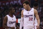 LOS ANGELES, CA - DECEMBER 30:  Chris Paul #3 and Blake Griffin #32 of the Los Angeles Clippers confer during hte game with the Chicago Bulls at Staples Center on December 30, 2011 in Los Angeles, California.  The Bulls won 114-101.  NOTE TO USER: User expressly acknowledges and agrees that, by downloading and or using this photograph, User is consenting to the terms and conditions of the Getty Images License Agreement.  (Photo by Stephen Dunn/Getty Images)
