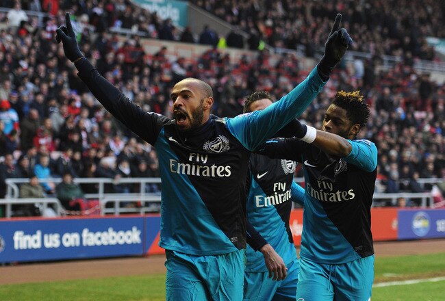 SUNDERLAND, ENGLAND - FEBRUARY 11:  Thierry Henry (L) of Arsenal celebrates scoring to make it 2-1 with Alex Song (R) during the Barclays Premier League match between Sunderland and Arsenal at the Stadium of Light on February 11, 2012 in Sunderland, England.  (Photo by Michael Regan/Getty Images)