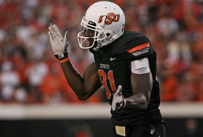 STILLWATER, OK - SEPTEMBER 8:  Wide receiver Justin Blackmon #81 of the Oklahoma State Cowboys celebrates after a play against the Arizona Wildcats during the first half on September 8, 2011 at Boone Pickens Stadium in Stillwater, Oklahoma.  Oklahoma State defeated Arizona 37-14.  (Photo by Brett Deering/Getty Images)