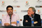 MIAMI GARDENS, FL - SEPTEMBER 28:  The Florida Marlins owner Jeffrey Loria (R) listens as Ozzie Guillen speaks while being introduced as the Marlin's new manager during a press conference at Sun Life Stadium on September 28, 2011 in Miami Gardens, Florida.  (Photo by Mike Ehrmann/Getty Images)