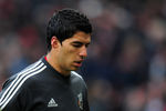 MANCHESTER, ENGLAND - FEBRUARY 11:  Luis Suarez of Liverpool walks off after the warm up prior to the Barclays Premier League match between Manchester United and Liverpool at Old Trafford on February 11, 2012 in Manchester, England.  (Photo by Shaun Botterill/Getty Images)