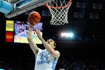 CHAPEL HILL, NC - FEBRUARY 11:  Tyler Zeller #44 of the North Carolina Tar Heels scores two of his game-high 25 points against the Virginia Cavaliers during play at the Dean Smith Center on February 11, 2012 in Chapel Hill, North Carolina. North Carolina won 70-52.  (Photo by Grant Halverson/Getty Images)