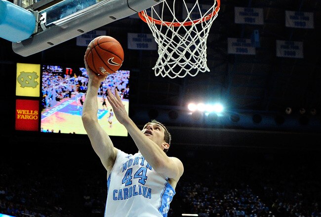 CHAPEL HILL, NC - FEBRUARY 11:  Tyler Zeller #44 of the North Carolina Tar Heels scores two of his game-high 25 points against the Virginia Cavaliers during play at the Dean Smith Center on February 11, 2012 in Chapel Hill, North Carolina. North Carolina won 70-52.  (Photo by Grant Halverson/Getty Images)