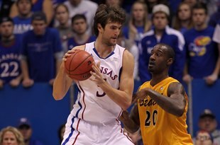 LAWRENCE, KS - DECEMBER 06:  Jeff Withey #5 of the Kansas Jayhawks in action during the game against the Long Beach State 49ers on December 6, 2011 at Allen Fieldhouse in Lawrence, Kansas.  (Photo by Jamie Squire/Getty Images)