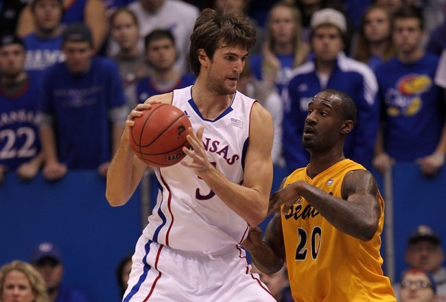 LAWRENCE, KS - DECEMBER 06:  Jeff Withey #5 of the Kansas Jayhawks in action during the game against the Long Beach State 49ers on December 6, 2011 at Allen Fieldhouse in Lawrence, Kansas.  (Photo by Jamie Squire/Getty Images)