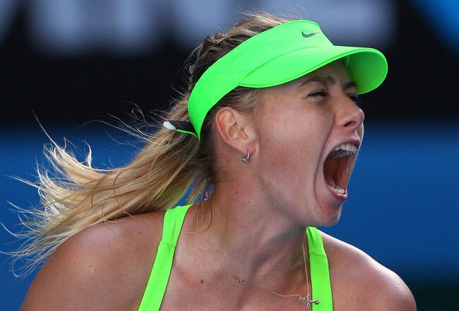 MELBOURNE, AUSTRALIA - JANUARY 26:  Maria Sharapova of Russia celebrates match point in her semifinal match against Petra Kvitova of the Czech Republic during day eleven of the 2012 Australian Open at Melbourne Park on January 26, 2012 in Melbourne, Australia.  (Photo by Cameron Spencer/Getty Images)