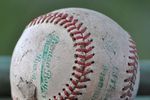 723px-a_worn-out_baseball_crop_150x100