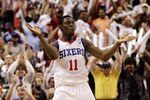 PHILADELPHIA, PA - APRIL 24: Jrue Holiday #11 of the Philadelphia 76ers celebrates after scoring against the Miami Heat in the fourth quarter of Game Four of the Eastern Conference Quarterfinals in the 2011 NBA Playoffs at Wells Fargo Center on April 24, 2011 in Philadelphia, Pennsylvania. NOTE TO USER: User expressly acknowledges and agrees that, by downloading and/or using this Photograph, User is consenting to the terms and conditions of the Getty Images License Agreement.  (Photo by Rob Carr/Getty Images)