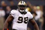 NEW ORLEANS - SEPTEMBER 26:  Sedrick Ellis #98 of the New Orleans Saints celebrates after a sack during the game against the Atlanta Falcons at the Louisiana Superdome on September 26, 2010 in New Orleans, Louisiana.  (Photo by Chris Graythen/Getty Images)