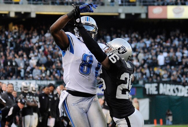 OAKLAND, CA - DECEMBER 18:  Stanford Routt #26 of the Oakland Raiders is called for pass interference on Calvin Johnson #81 of the Detroit Lions late in the fourth quarter at O.co Coliseum on December 18, 2011 in Oakland, California. The Lions won the game 28-27. (Photo by Thearon W. Henderson/Getty Images)