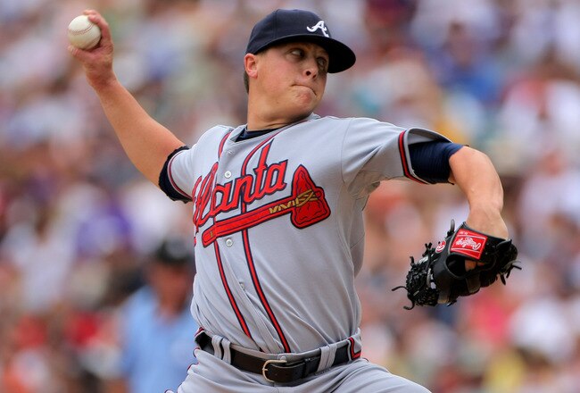 DENVER - JULY 12:  Starting pitcher Kris Medlen #54 of the Atlanta Braves delivers against  the Colorado Rockies during MLB action at Coors Field on July 12, 2009 in Denver, Colorado.  (Photo by Doug Pensinger/Getty Images)