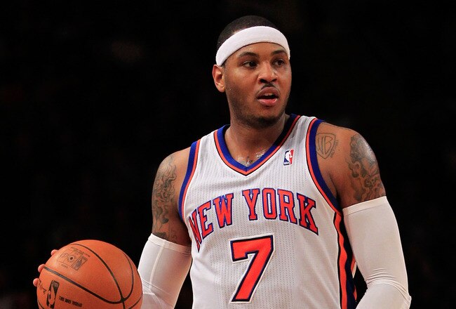 NEW YORK, NY - JANUARY 09: Carmelo Anthony #7 of the New York Knicks dribbles against the Charlotte Bobcats at Madison Square Garden on January 9, 2012 in New York City. NOTE TO USER: User expressly acknowledges and agrees that, by downloading and or using this photograph, User is consenting to the terms and conditions of the Getty Images License Agreement.  (Photo by Chris Trotman/Getty Images)