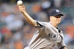 BALTIMORE, MD - AUGUST 26:  A.J. Burnett #34 of the New York Yankees pitches during a baseball game against the Baltimore Orioles at Oriole Park at Camden Yards on August 26, 2011 in Baltimore, Maryland.  (Photo by Mitchell Layton/Getty Images)