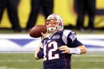 INDIANAPOLIS, IN - FEBRUARY 05:  Quarterback Tom Brady #12 of the New England Patriots looks to throw against the New York Giants during Super Bowl XLVI at Lucas Oil Stadium on February 5, 2012 in Indianapolis, Indiana.  (Photo by Jeff Gross/Getty Images)