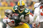 GREEN BAY, WI - NOVEMBER 20:  James Starks #44 of the Green Bay Packers carries the ball against the Tampa Bay Buccaneers at Lambeau Field on November 20, 2011 in Green Bay, Wisconsin.  (Photo by Matthew Stockman/Getty Images)