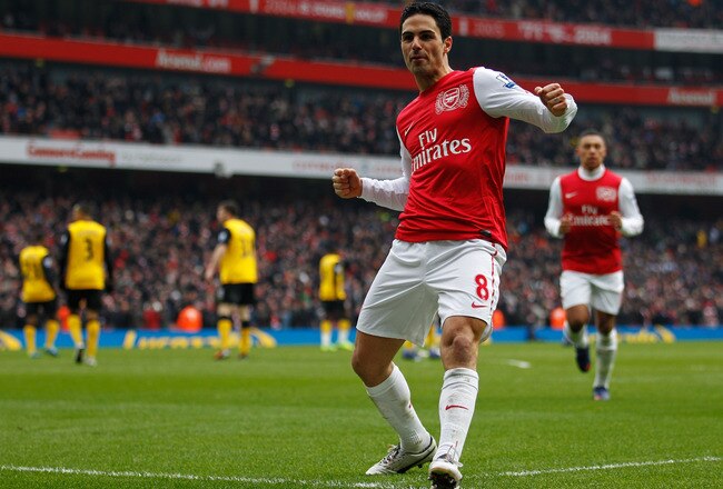 LONDON, ENGLAND - FEBRUARY 04:  Mikel Arteta of Arsenal celebrates after scoring Arsenal's forth goal during the Barclays Premier League match between Arsenal and Blackburn Rovers at Emirates Stadium on February 4, 2012 in London, England.  (Photo by Paul Gilham/Getty Images)