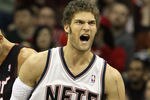 NEWARK, NJ - APRIL 03:  Brook Lopez #11 of the New Jersey Nets reacts against the Miami Heat at the Prudential Center on April 3, 2011 in Newark, New Jersey.The Heat defeated the Nets 108-94.NOTE TO USER: User expressly acknowledges and agrees that, by downloading and/or using this Photograph, user is consenting to the terms and conditions of the Getty Images License Agreement.  (Photo by Jim McIsaac/Getty Images)