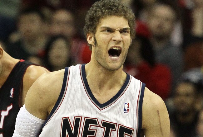 NEWARK, NJ - APRIL 03:  Brook Lopez #11 of the New Jersey Nets reacts against the Miami Heat at the Prudential Center on April 3, 2011 in Newark, New Jersey.The Heat defeated the Nets 108-94.NOTE TO USER: User expressly acknowledges and agrees that, by downloading and/or using this Photograph, user is consenting to the terms and conditions of the Getty Images License Agreement.  (Photo by Jim McIsaac/Getty Images)