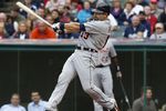 CLEVELAND, OH - SEPTEMBER 7:   Alex Avila #13 of the Detroit Tigers hits a sacrifice fly ball against the Cleveland Indians to score Miguel Cabrera #24 (not pictured) during the fourth inning of their game on September 7, 2011 at Progressive Field in Cleveland, Ohio.  The Tigers defeated the Indians 8-6.   (Photo by David Maxwell/Getty Images)