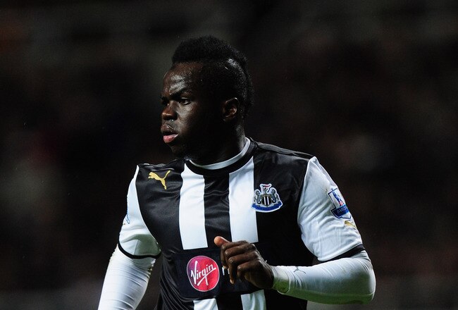 NEWCASTLE UPON TYNE, ENGLAND - JANUARY 04:  Newcastle player Cheick Tiote in action wearing the new sponsors logo during the Barclays Premier league game between Newcastle United and Manchester United at St James' Park on January 4, 2012 in Newcastle upon Tyne, England.  (Photo by Stu Forster/Getty Images)