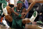 BOSTON, MA - JANUARY 16:  Paul Pierce #34 of the Boston Celtics tries to hang on to the ball as Thabo Sefolosha #2 and Russell Westbrook #0 of the Oklahoma City Thunder defend on January 16, 2012 at TD Garden in Boston, Massachusetts. The Oklahoma City Thunder defeated the Boston Celtics 97-88. NOTE TO USER: User expressly acknowledges and agrees that, by downloading and or using this photograph, User is consenting to the terms and conditions of the Getty Images License Agreement.  (Photo by Elsa/Getty Images)
