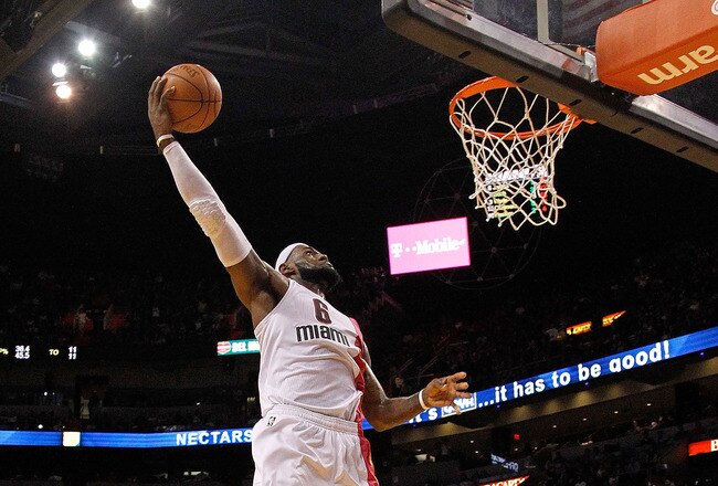 MIAMI, FL - FEBRUARY 07:  LeBron James #6 of the Miami Heat dunks during a game against the Cleveland Cavaliers at American Airlines Arena on February 7, 2012 in Miami, Florida. NOTE TO USER: User expressly acknowledges and agrees that, by downloading and/or using this Photograph, User is consenting to the terms and conditions of the Getty Images License Agreement.  (Photo by Mike Ehrmann/Getty Images)