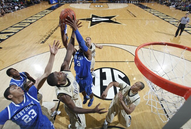 NASHVILLE, TN - FEBRUARY 11: Terrence Jones #3 of the Kentucky Wildcats rebounds against Festus Ezeli #3 of the Vanderbilt Commodores at Memorial Gymnasium on February 11, 2012 in Nashville, Tennessee. Kentucky won 69-63. (Photo by Joe Robbins/Getty Images)