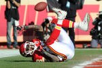 KANSAS CITY, MO - DECEMBER 24:  Wide receiver Dwayne Bowe #82 of the Kansas City Chiefs drops a potential touchdown against the Oakland Raiders during the first half on December 24, 2011 at Arrowhead Stadium in Kansas City, Missouri.  (Photo by Peter Aiken/Getty Images)