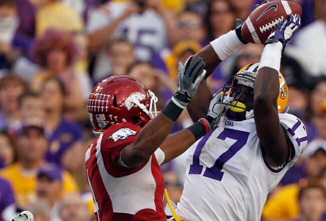 BATON ROUGE, LA - NOVEMBER 25:  Morris Claiborne #17 of the Louisiana State University Tigers catches an interception intended for Jarius Wright #4 of the Arkansas Razorbacks at Tiger Stadium on November 25, 2011 in Baton Rouge, Louisiana.  (Photo by Chris Graythen/Getty Images)