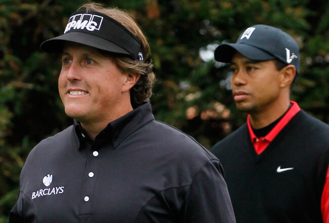 PEBBLE BEACH, CA - FEBRUARY 12: (L-R)Phil Mickelson and Tiger Woods are seen on the second tee during the final round of the AT&T Pebble Beach National Pro-Am at Pebble Beach Golf Links on February 12, 2012 in Pebble Beach, California.  (Photo by Jeff Gross/Getty Images)