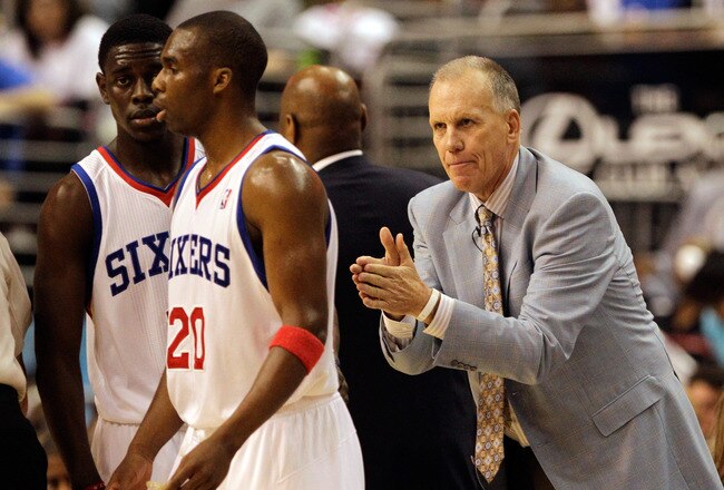 PHILADELPHIA, PA - APRIL 24: Coach Doug Collins of the Philadelphia 76ers gestures to players Jrue Holiday #11 (L) and Jodie Meeks #20 during the second half in Game Four of the Eastern Conference Quarterfinals in the 2011 NBA Playoffs at Wells Fargo Center on April 24, 2011 in Philadelphia, Pennsylvania. NOTE TO USER: User expressly acknowledges and agrees that, by downloading and/or using this Photograph, User is consenting to the terms and conditions of the Getty Images License Agreement.  (Photo by Rob Carr/Getty Images)
