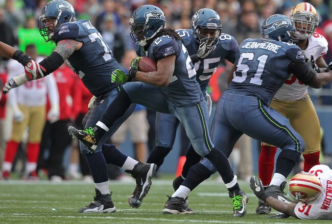 SEATTLE - DECEMBER 24:  Running back Marshawn Lynch #24 of the Seattle Seahawks rushes against the San Francisco 49ers at CenturyLink Field on December 24, 2011 in Seattle, Washington. (Photo by Otto Greule Jr/Getty Images)