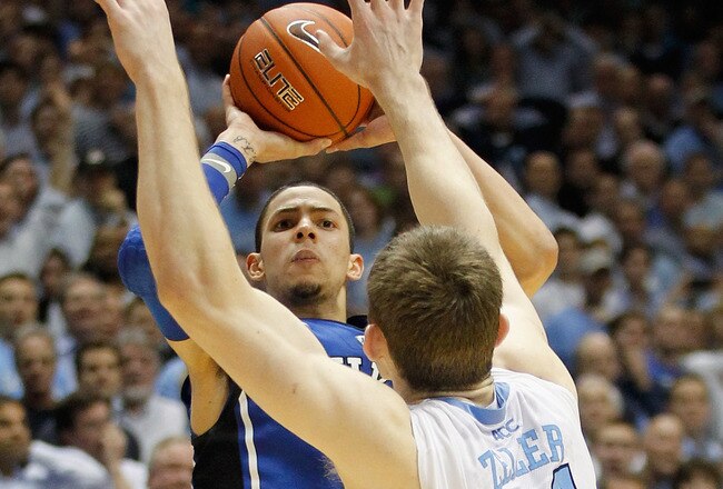 CHAPEL HILL, NC - FEBRUARY 08:  Austin Rivers #0 of the Duke Blue Devils shoots the game-winning 3 pointer over Tyler Zeller #44 to defeat the North Carolina Tar Heels 85-84 during their game at the Dean Smith Center on February 8, 2012 in Chapel Hill, North Carolina.  (Photo by Streeter Lecka/Getty Images)