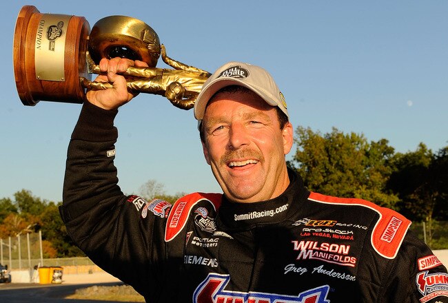 CONCORD, NC - SEPTEMBER 19:  Pro Stock winner Greg Anderson celebrates with his Wally during the O'Reilly Auto Parts NHRA Nationals at zMax Dragway on September 19, 2010 in Concord, North Carolina.  (Photo by Rusty Jarrett/Getty Images)