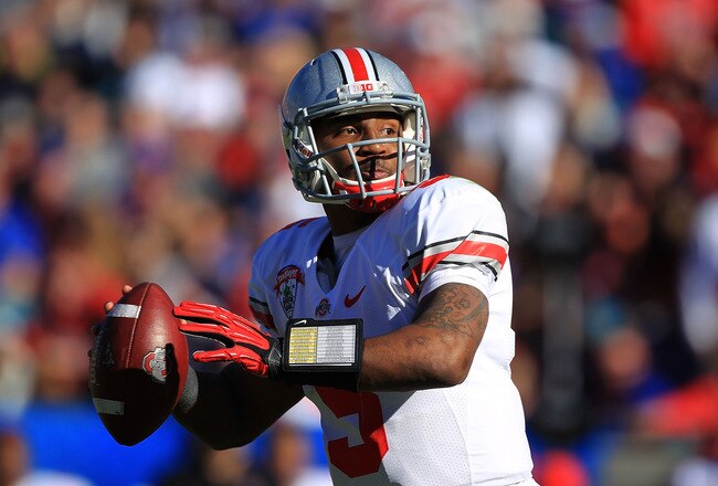 JACKSONVILLE, FL - JANUARY 02:  Quaterback Braxton Miller #5 of Ohio State Buckeyes looks to pass during the first half at the TaxSlayer.com Gator Bowl against the Florida Gators at EverBank Field on January 2, 2012 in Jacksonville, Florida.  (Photo by Scott Halleran/Getty Images)