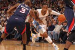 DENVER, CO - FEBRUARY 28:  J.R. Smith #5 of the Denver Nuggets drives the ball against Damien Wilkins #3 of the Atlanta Hawks during NBA action at the Pepsi Center on February 28, 2011 in Denver, Colorado. The Nuggets deafeated the Hawks 100-90. NOTE TO USER: User expressly acknowledges and agrees that, by downloading and or using this photograph, User is consenting to the terms and conditions of the Getty Images License Agreement.  (Photo by Doug Pensinger/Getty Images)