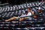 ATLANTA - SEPTEMBER 27: Fans of the Atlanta Braves linger in the stands after the game against the Philadelphia Phillies at Turner Field on September 27, 2011 in Atlanta, Georgia. (Photo by Scott Cunningham/Getty Images)