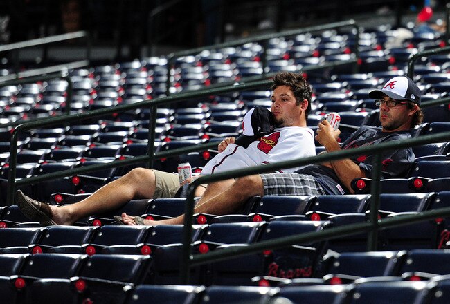 ATLANTA - SEPTEMBER 27: Fans of the Atlanta Braves linger in the stands after the game against the Philadelphia Phillies at Turner Field on September 27, 2011 in Atlanta, Georgia. (Photo by Scott Cunningham/Getty Images)