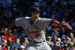 CHICAGO - SEPTEMBER 24: Starting pitcher Adam Wainwright #50 of the St. Louis Cardinals pitches his way to his 20th win of the season against the Chicago Cubs at Wrigley Field on September 24, 2010 in Chicago, Illinois. The Cardinals defeated the Cubs 7-1. (Photo by Jonathan Daniel/Getty Images)