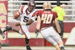 CHESTNUT HILL, MA - SEPTEMBER 25:  Tyrod Taylor #5 of the Virginia Tech Hokies scrambles with the ball as Luke Kuechly #40 of the Boston College Eagles defends on September 25, 2010 at Alumni Stadium in Chestnut Hill, Massachusetts.  (Photo by Elsa/Getty Images)