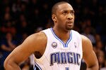 ORLANDO, FL - JANUARY 24:  Gilbert Arenas #1 of the Orlando Magic looks at the scoreboard during the game against the Detroit Pistons at Amway Arena on January 24, 2011 in Orlando, Florida.  NOTE TO USER: User expressly acknowledges and agrees that, by downloading and or using this Photograph, user is consenting to the terms and conditions of the Getty Images License Agreement.  (Photo by Sam Greenwood/Getty Images)