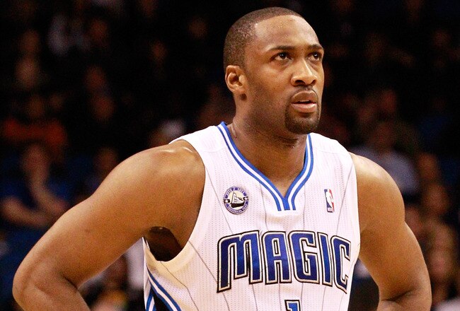 ORLANDO, FL - JANUARY 24:  Gilbert Arenas #1 of the Orlando Magic looks at the scoreboard during the game against the Detroit Pistons at Amway Arena on January 24, 2011 in Orlando, Florida.  NOTE TO USER: User expressly acknowledges and agrees that, by downloading and or using this Photograph, user is consenting to the terms and conditions of the Getty Images License Agreement.  (Photo by Sam Greenwood/Getty Images)