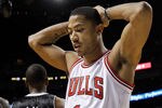MIAMI, FL - JANUARY 29:  Derrick Rose #1 of the Chicago Bulls looks on during a game against the Miami Heat at American Airlines Arena on January 29, 2012 in Miami, Florida. NOTE TO USER: User expressly acknowledges and agrees that, by downloading and/or using this Photograph, User is consenting to the terms and conditions of the Getty Images License Agreement.  (Photo by Mike Ehrmann/Getty Images)