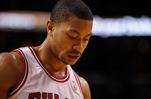 MIAMI, FL - JANUARY 29:  Derrick Rose #1 of the Chicago Bulls looks on during a game against the Miami Heat at American Airlines Arena on January 29, 2012 in Miami, Florida. NOTE TO USER: User expressly acknowledges and agrees that, by downloading and/or using this Photograph, User is consenting to the terms and conditions of the Getty Images License Agreement.  (Photo by Mike Ehrmann/Getty Images)