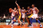 NEW YORK, NY - FEBRUARY 10:  Jeremy Lin #17 of the New York Knicks drives against Pau Gasol #16 of the Los Angeles Lakers in the fourth quarter at Madison Square Garden on February 10, 2012 in New York City.  NOTE TO USER: User expressly acknowledges and agrees that, by downloading and or using this photograph, User is consenting to the terms and conditions of the Getty Images License Agreement.  (Photo by Chris Chambers/Getty Images)